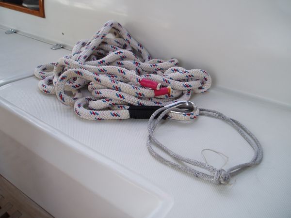 New Improved Snubber: 60’ of line with thimble whipped halfway into a V bridle and New Amsteel Soft Shackle to connect snubber to anchor line 
